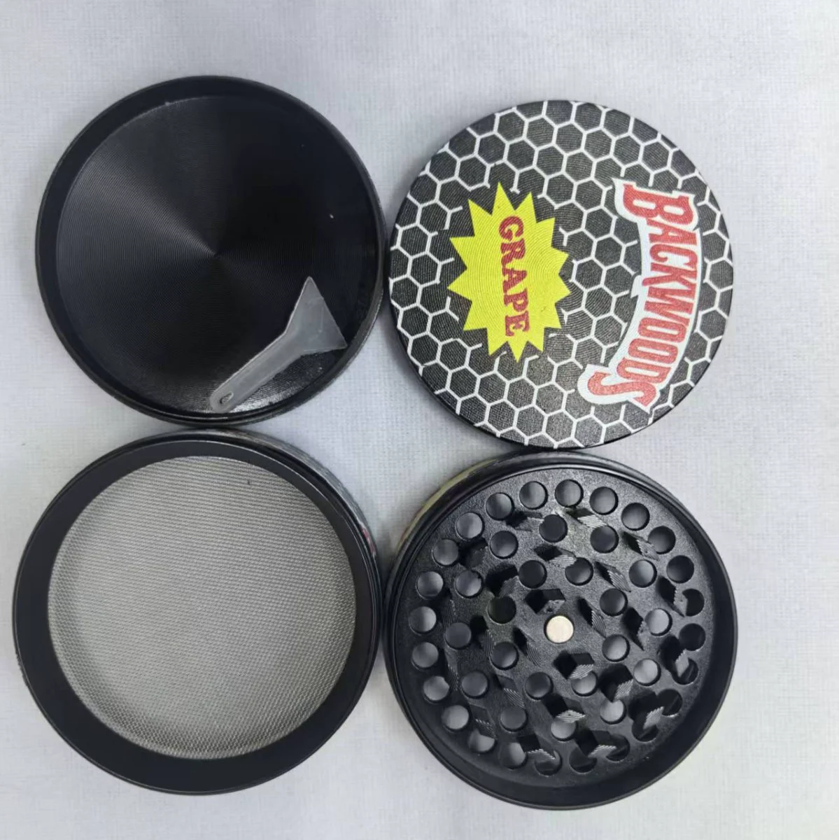 Four-part metal accessory construction and custom top cover artwork
